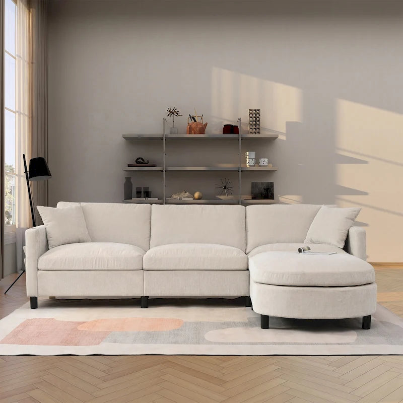 Quatre canapés d'angle avec poufs amovibles