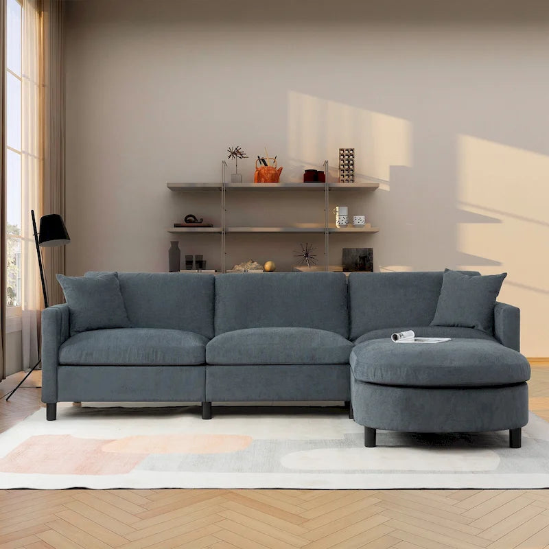 Quatre canapés d'angle avec poufs amovibles