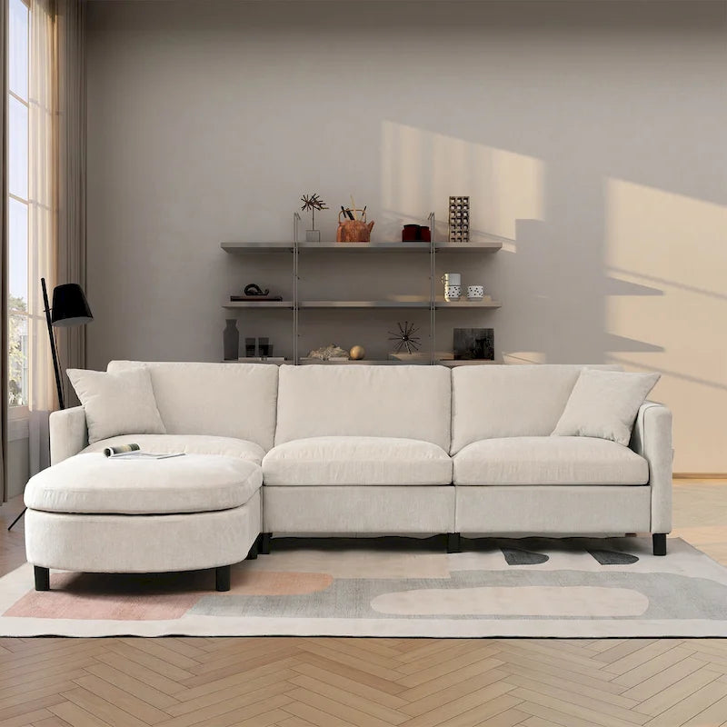 Quatre canapés d'angle avec poufs amovibles