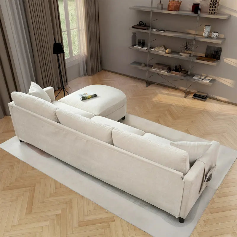 Quatre canapés d'angle avec poufs amovibles