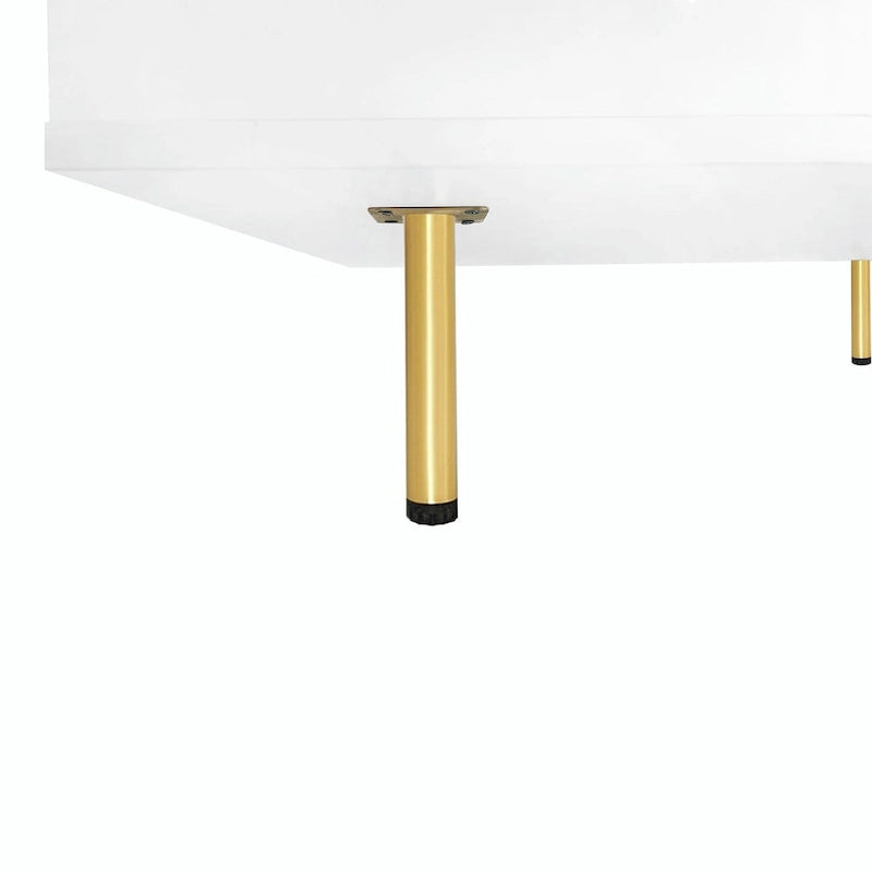 Table basse : 4 pieds dorés, 2 tiroirs, design carré à double plateau.
